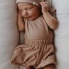 A baby Brand romper | Woolskins