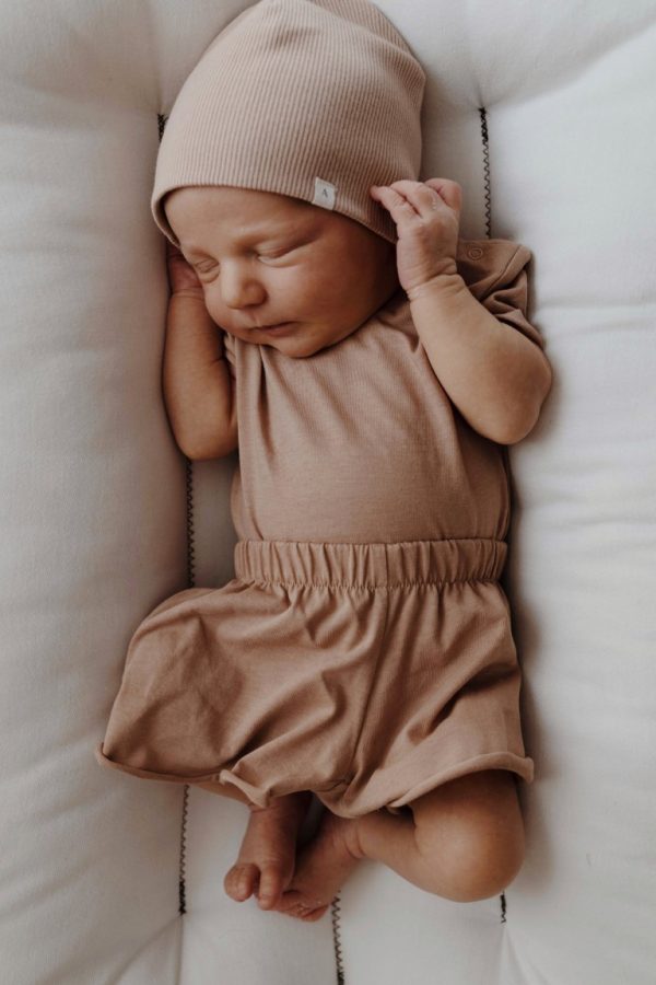 A baby Brand romper | Woolskins