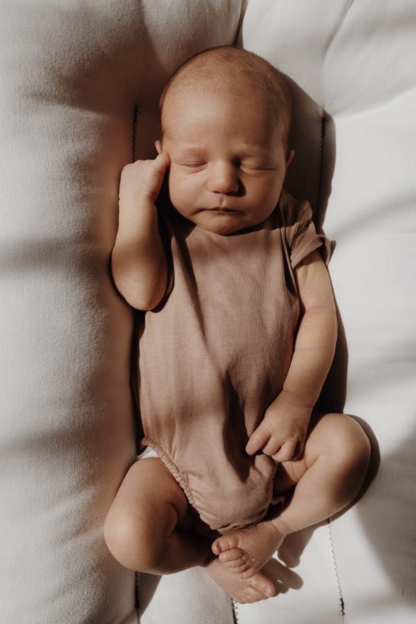 A baby Brand romper | Woolskins